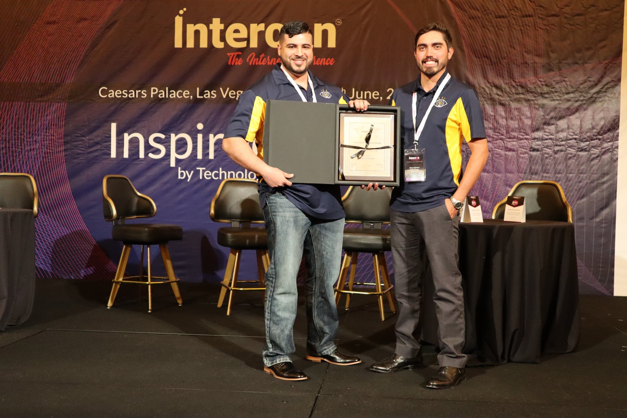 CBI Leadership receiving award at Intercom conference